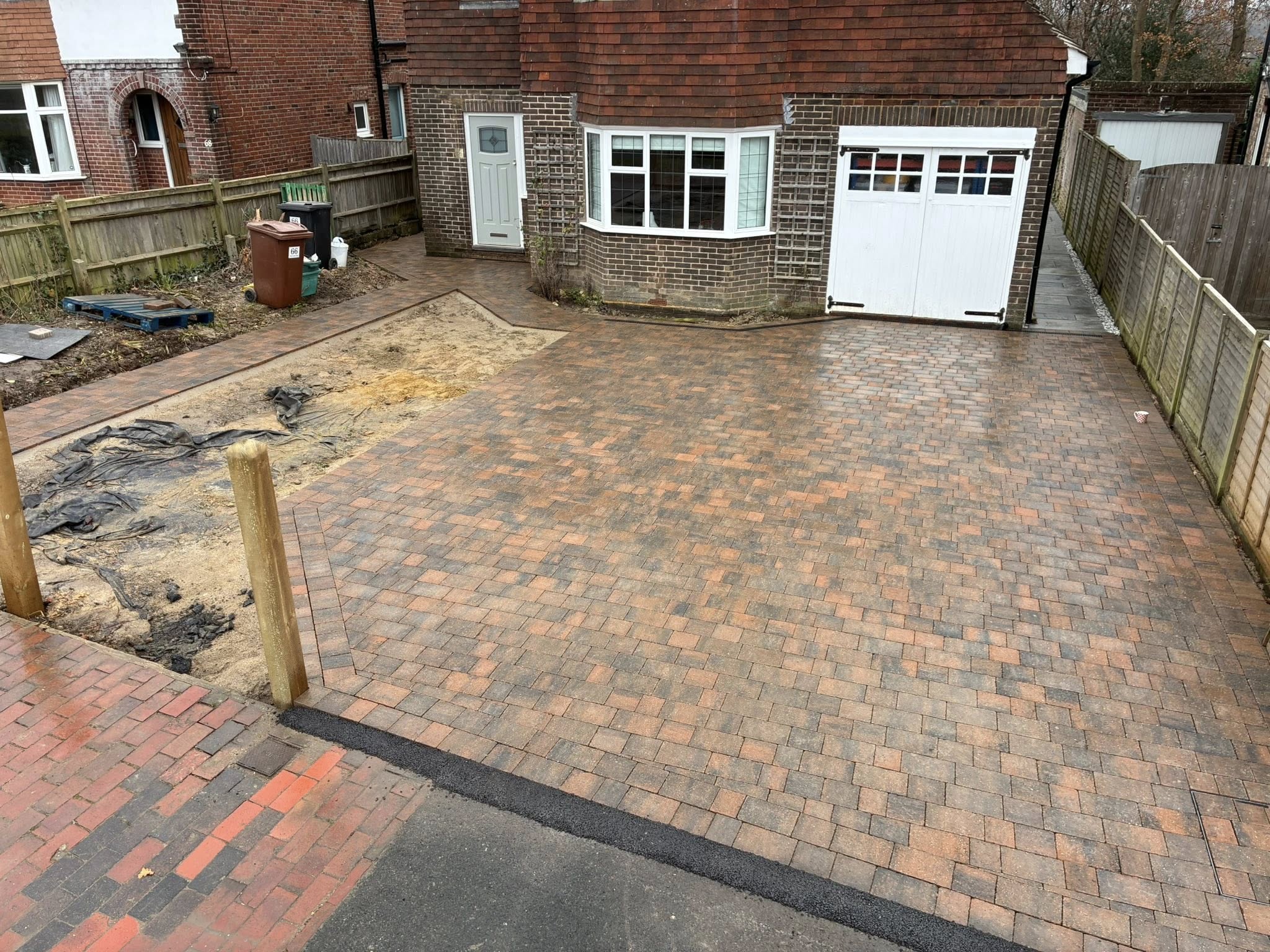 After: New block paving driveway in herringbone pattern